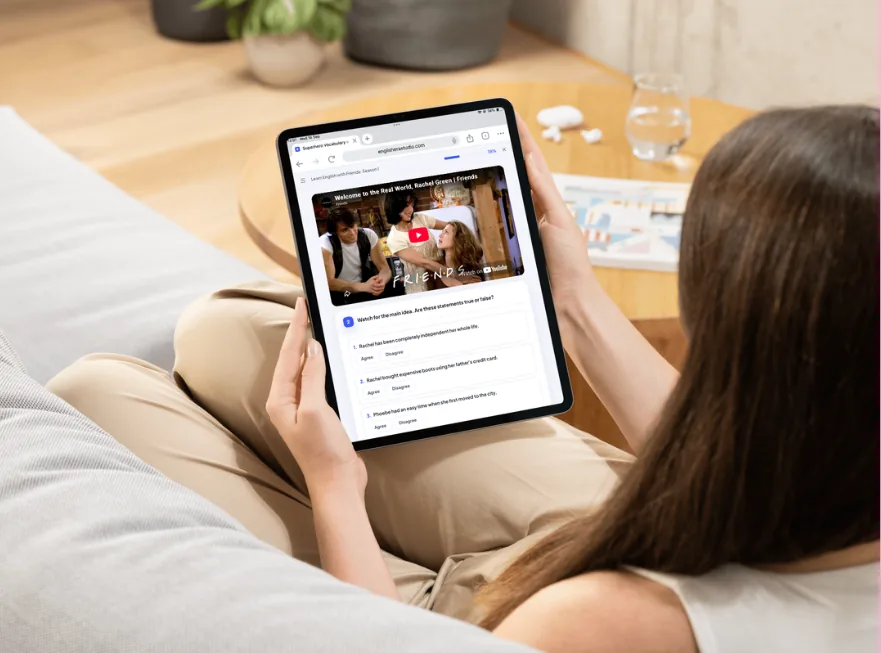 A learner choosing an English Era Studio course on a tablet